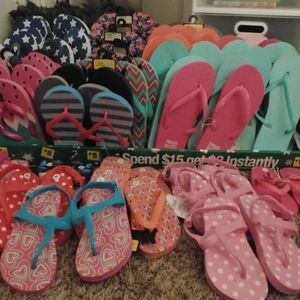 Over 100 pair of flip flops from infant to adult t